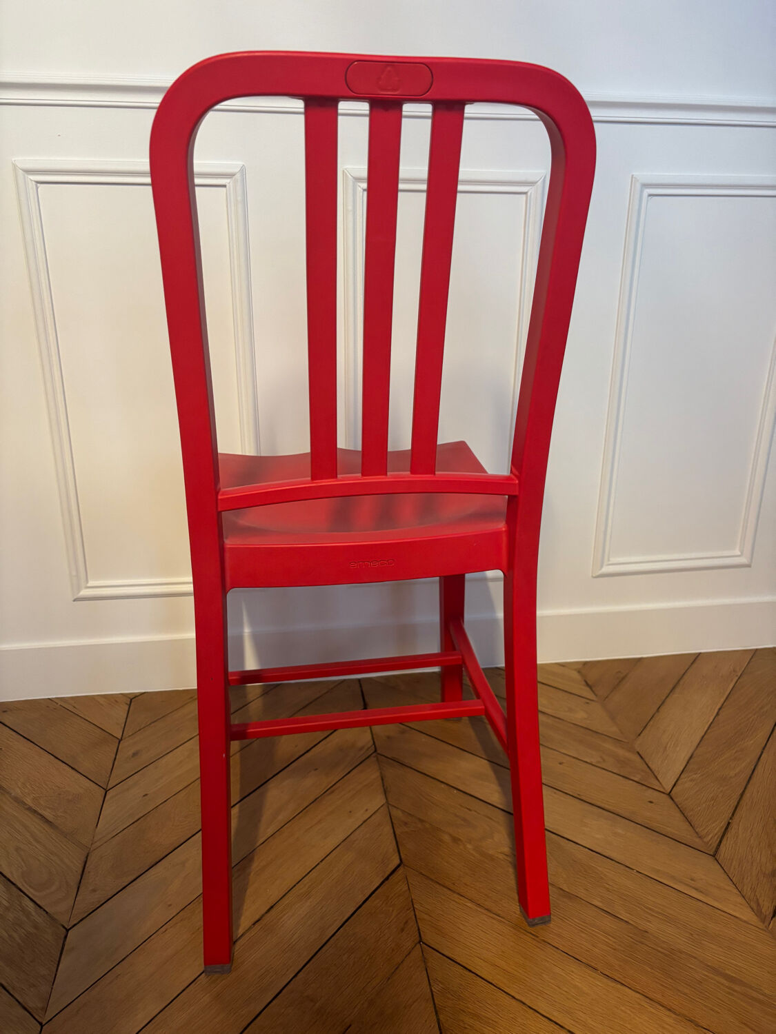 Set of 6 red Emeco chairs