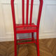 Set of 6 red Emeco chairs