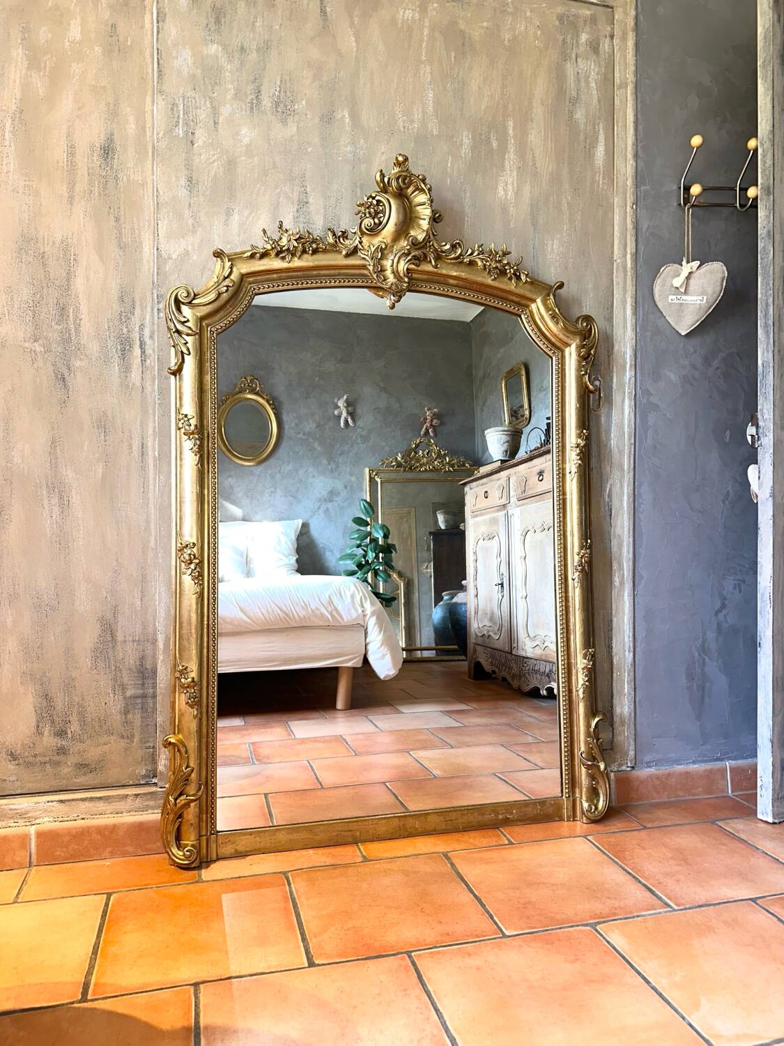 Antique mirror with pediment, 19th century