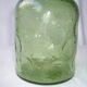 Bouteille vintage en verre bullé vert
