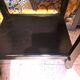 Art Deco style side table, console table on wheels, black varnished wood, 1940