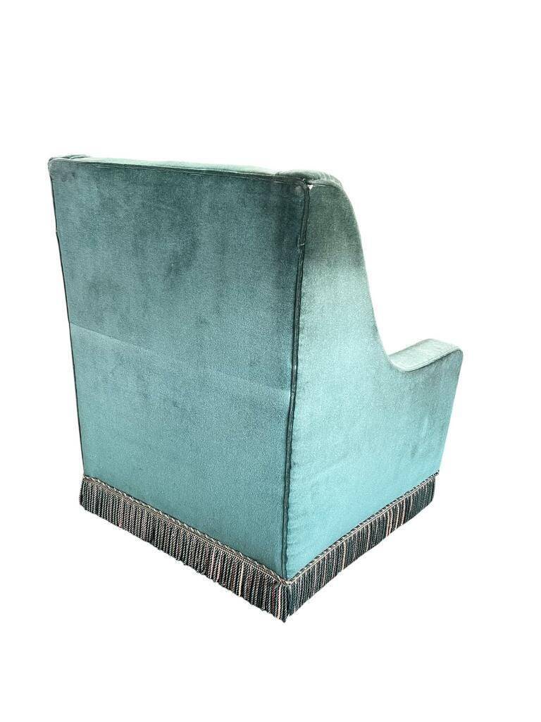 Fauteuil vintage turquoise avec franges