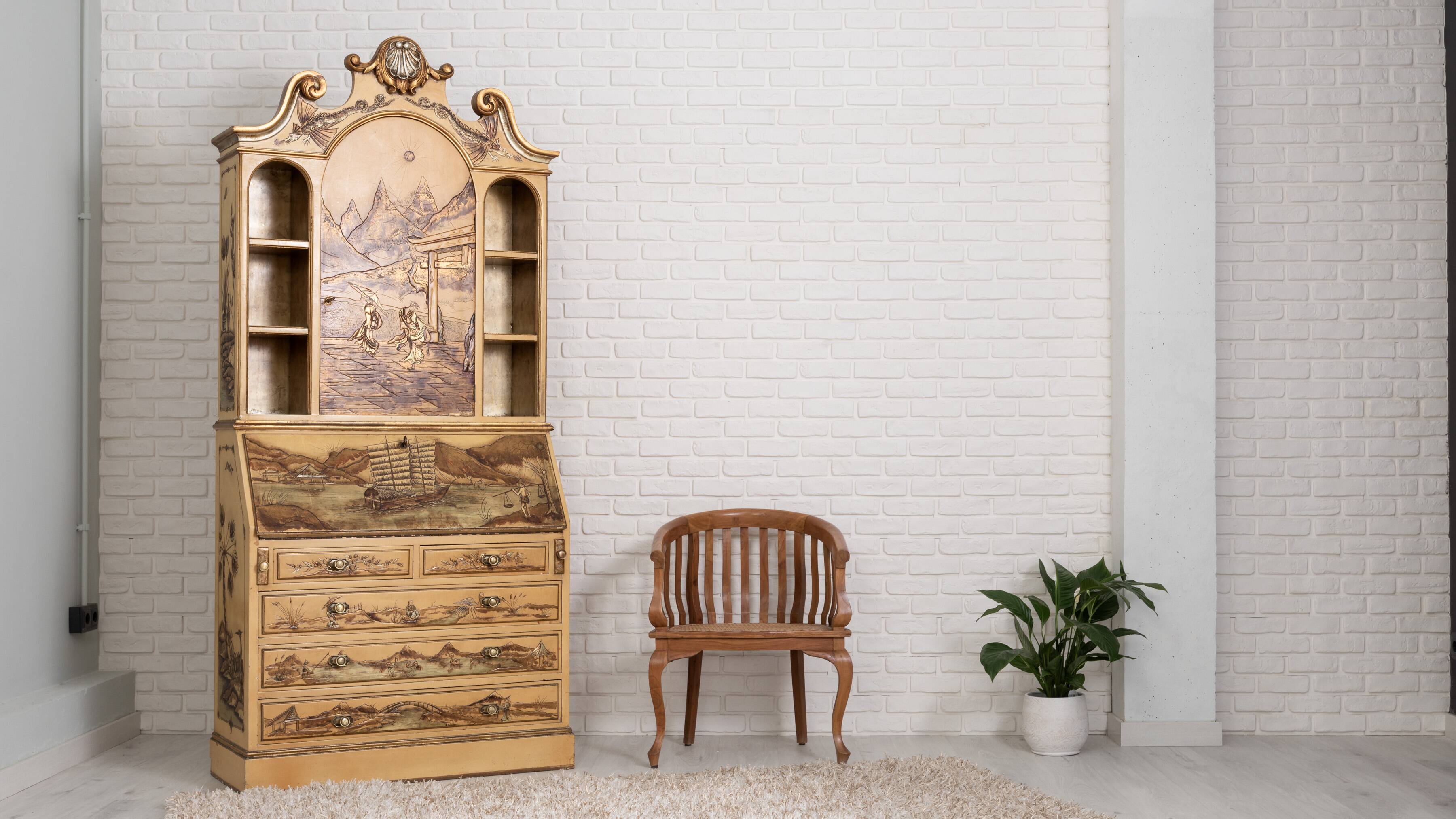 Desk with oriental motifs in relief