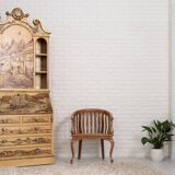Desk with oriental motifs in relief