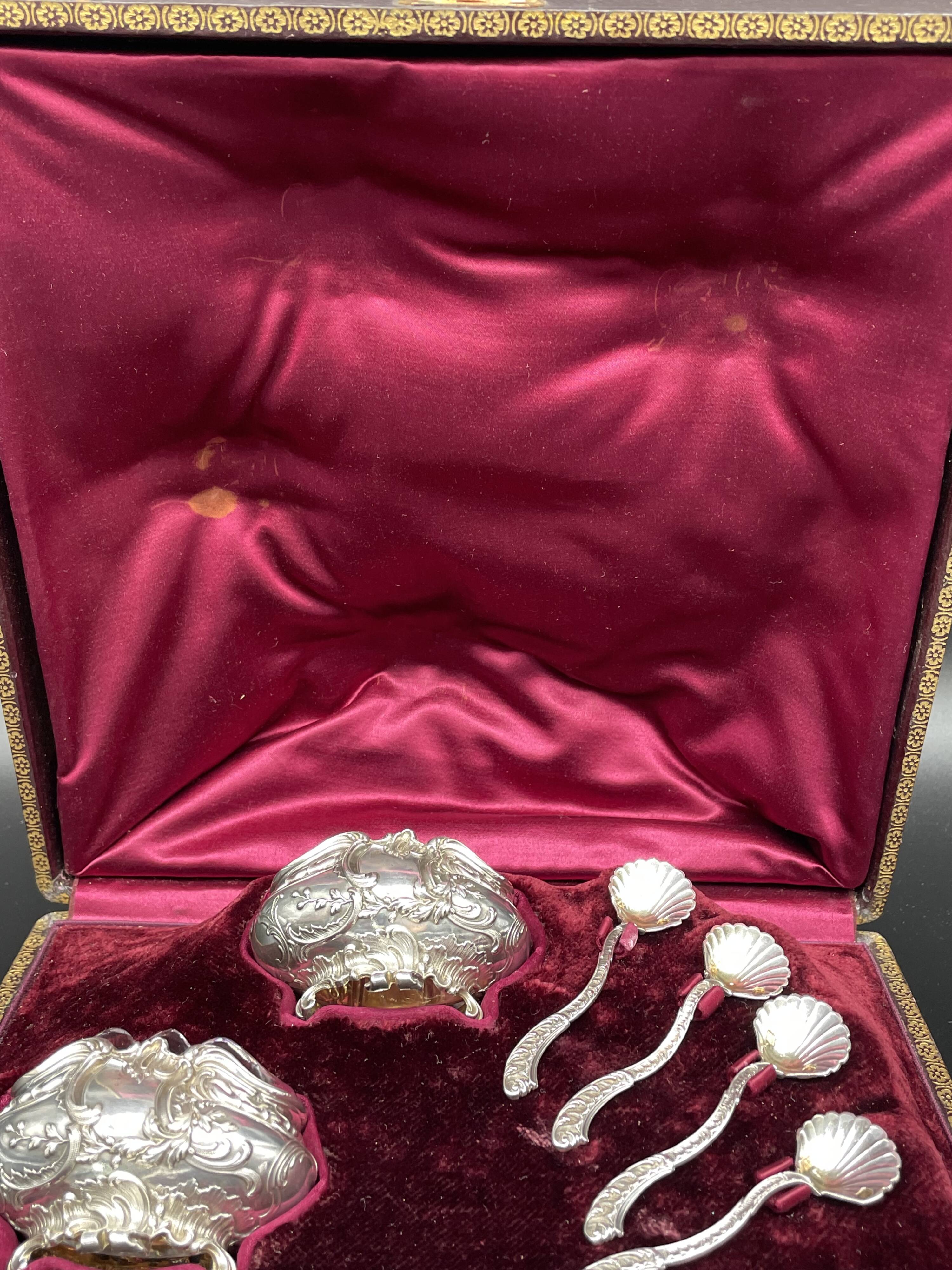 4 salt pots, silver, Ravinet D'enfert, 4 shovels, white glass interior, case, purple interior, 19th century