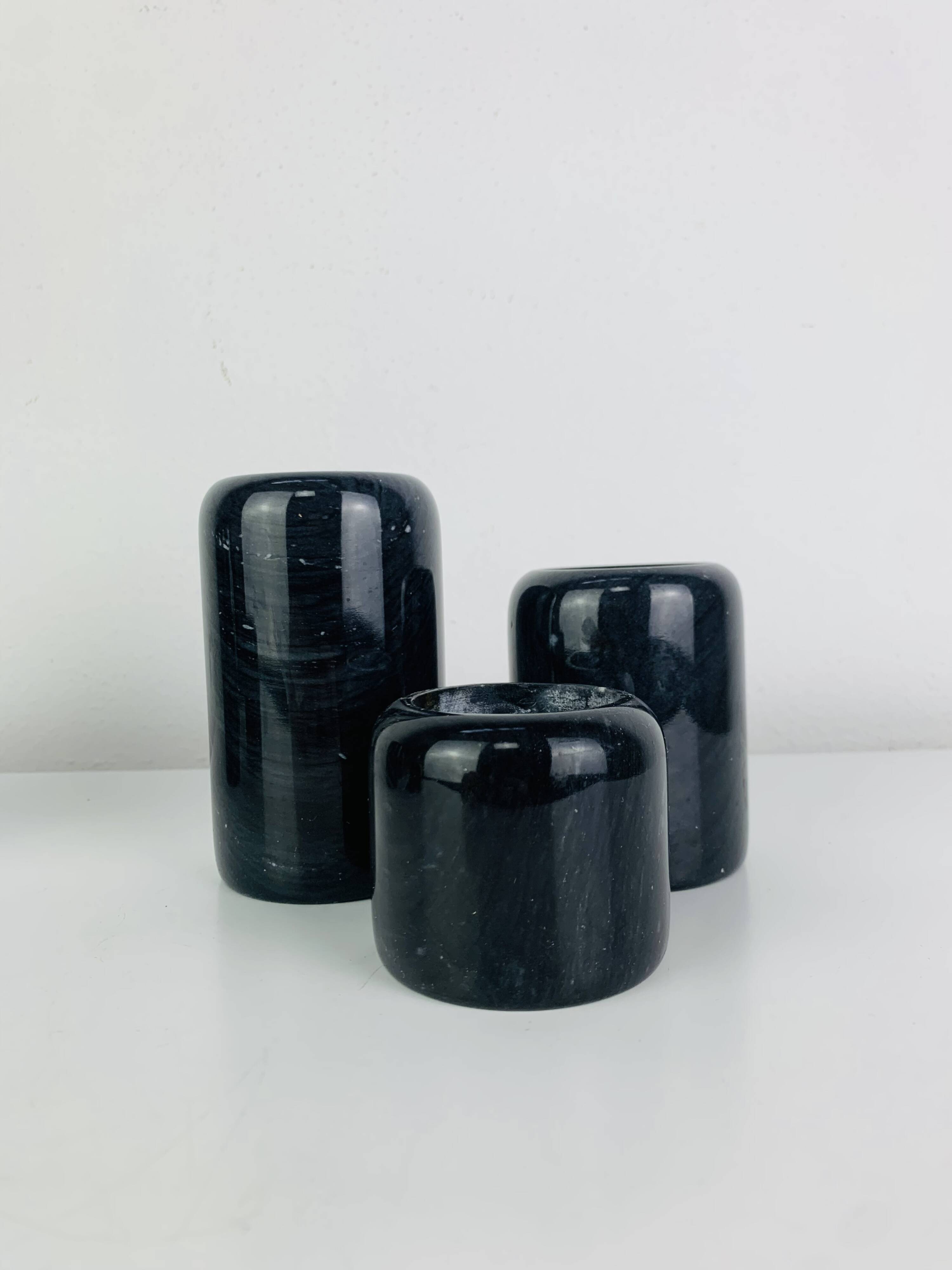 Vintage black marble candlestick trio