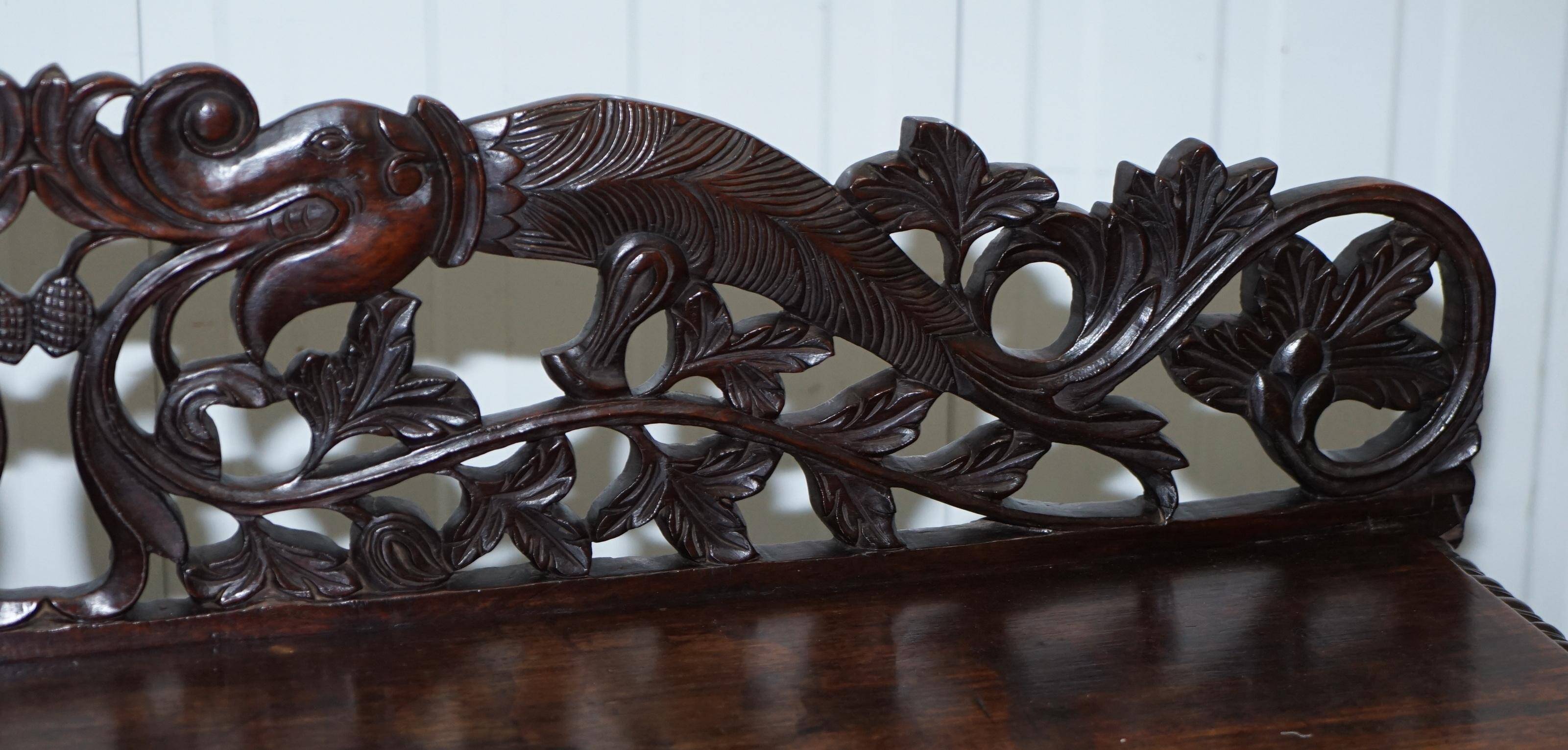 19th-century hand-carved Anglo-Burmese buffet with drawers and cupboards.