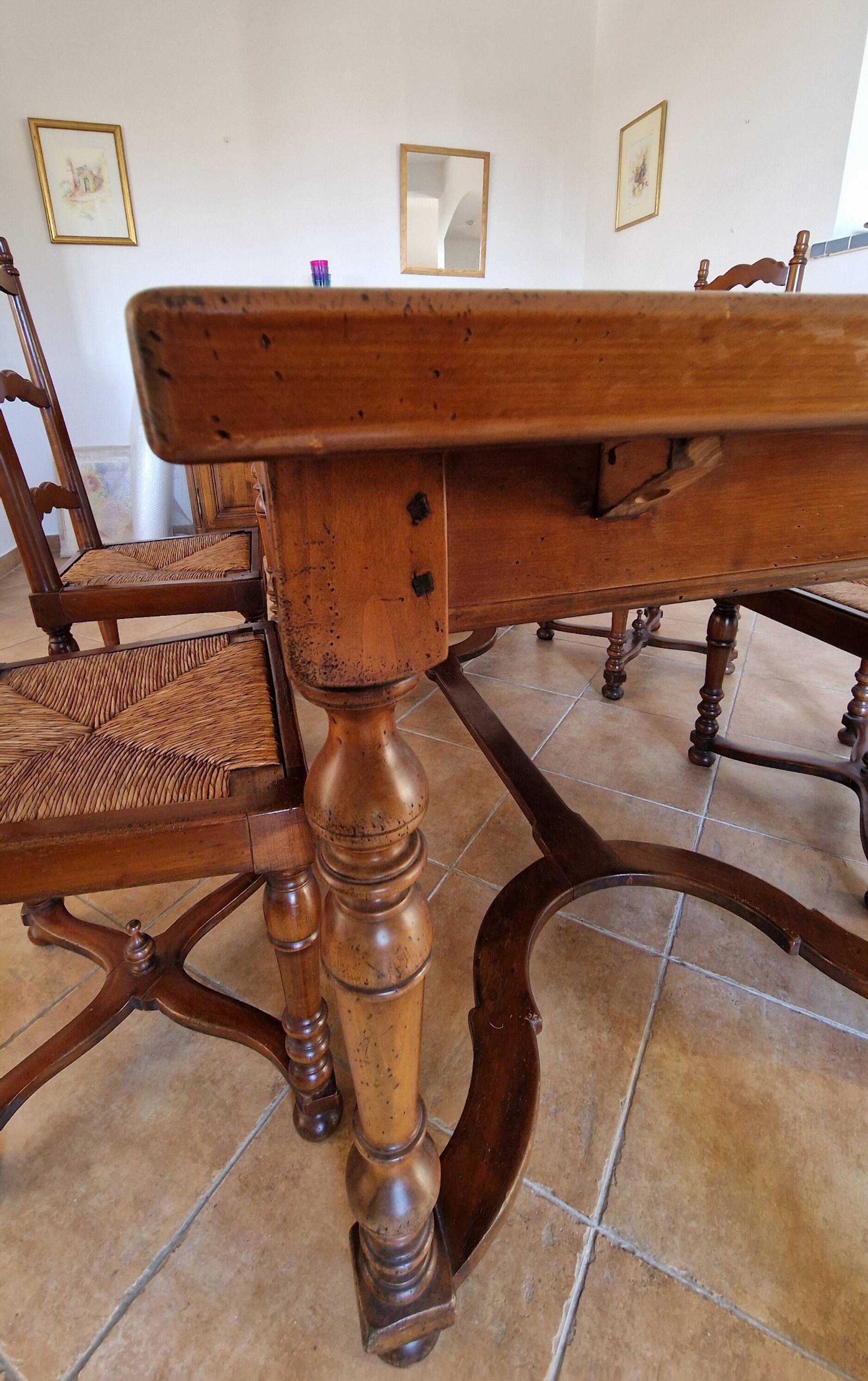 Marquetry wooden dining table with its 6 chairs.