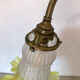 Yellow brass and opaline lamp
