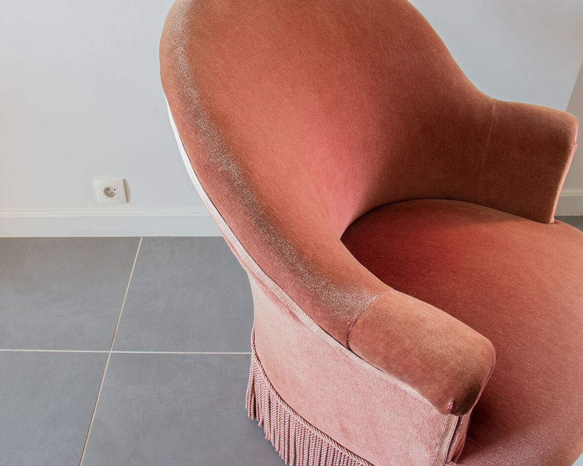 Old pink toad armchair