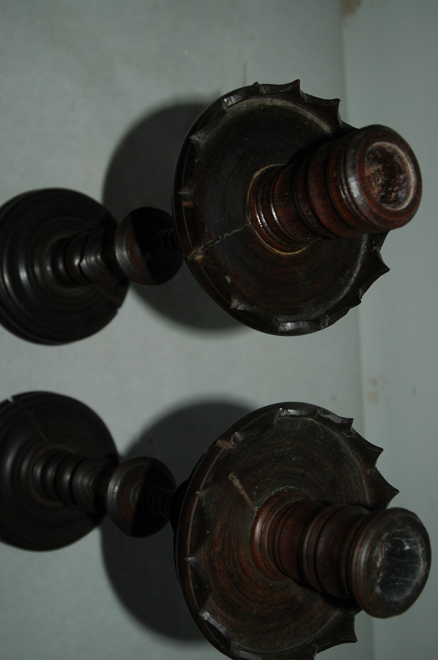 Pair of mahogany turned wood candlesticks