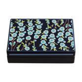Boîte en tôle émaillée motif fleuri par Jean Neuhaus