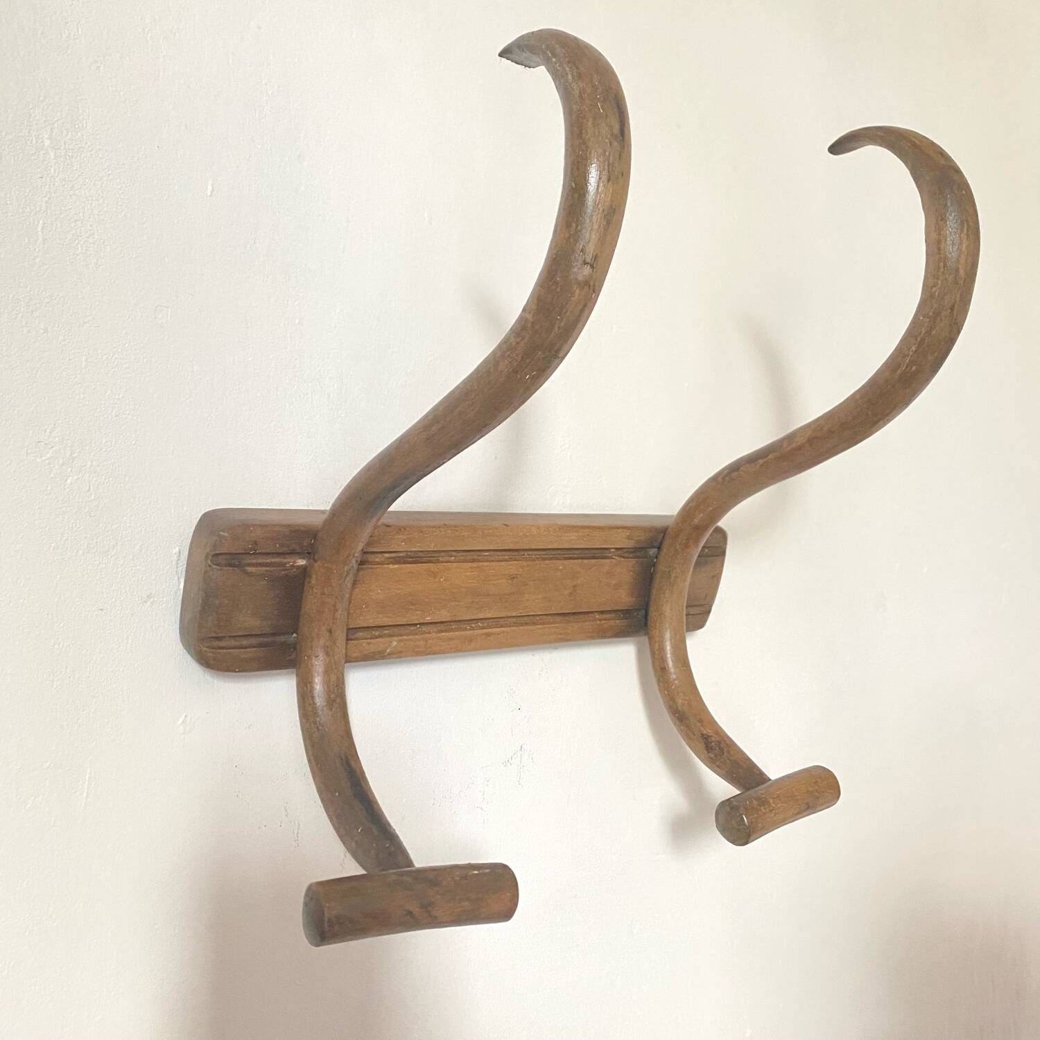 Curved wooden coat rack from the early 20th century