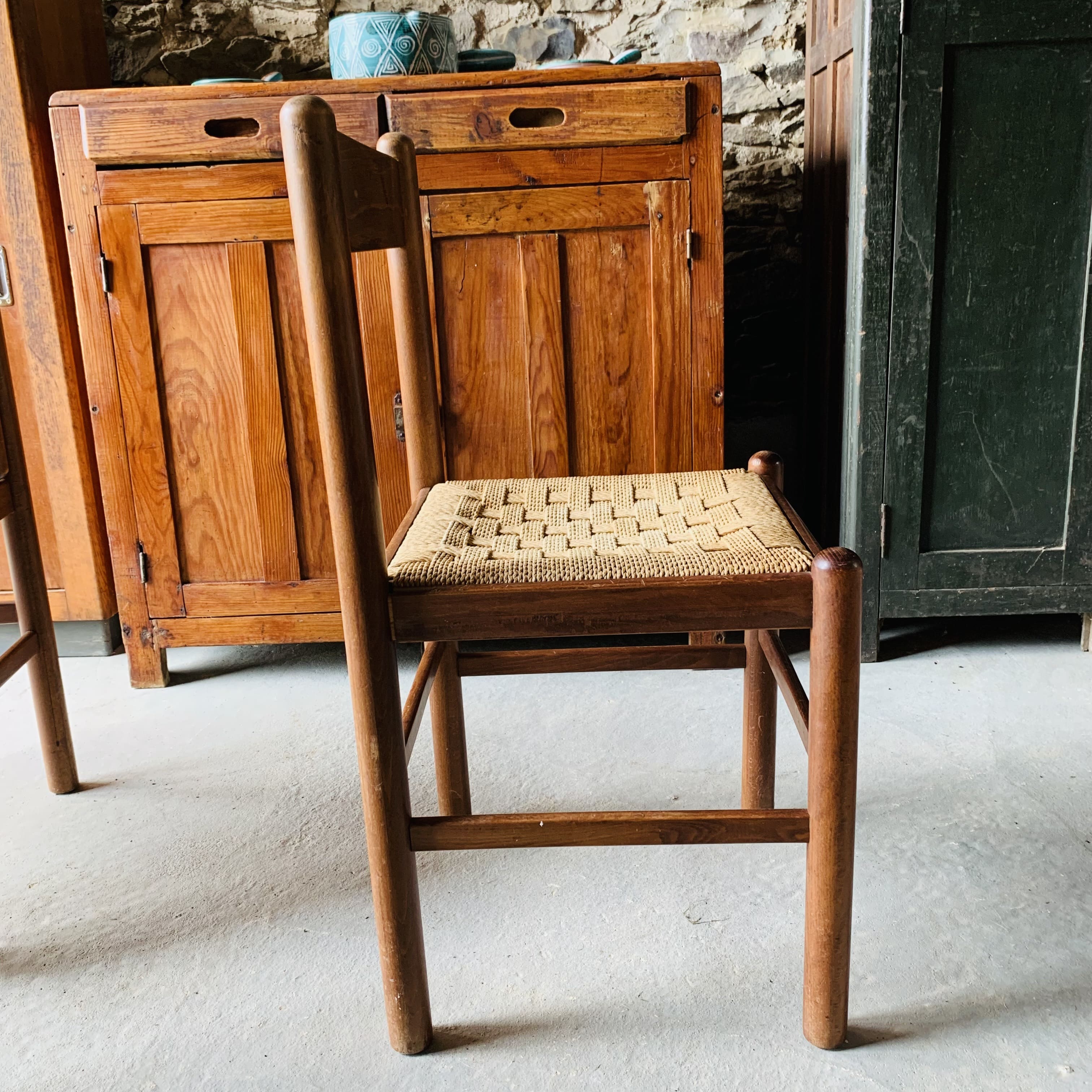 5 chairs made of wood and rope