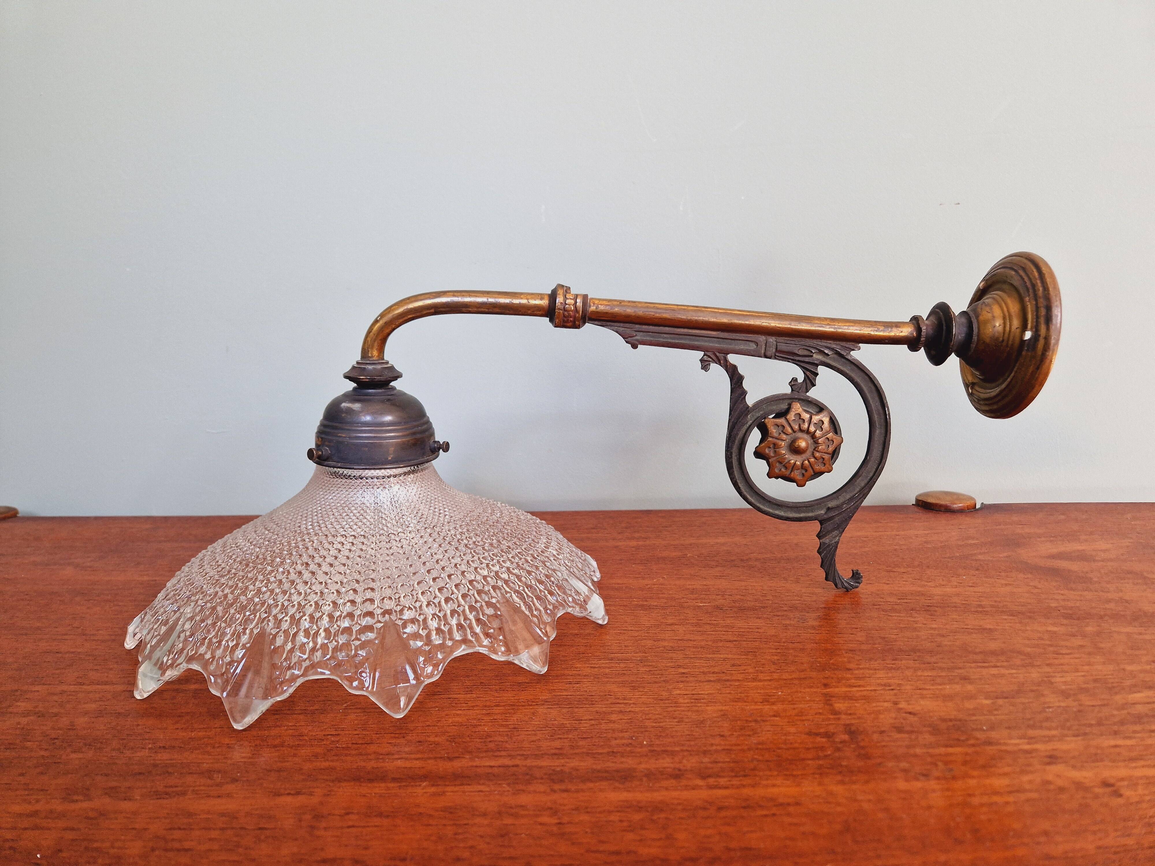Pair of pendant lights in bronze and scalloped transparent glass