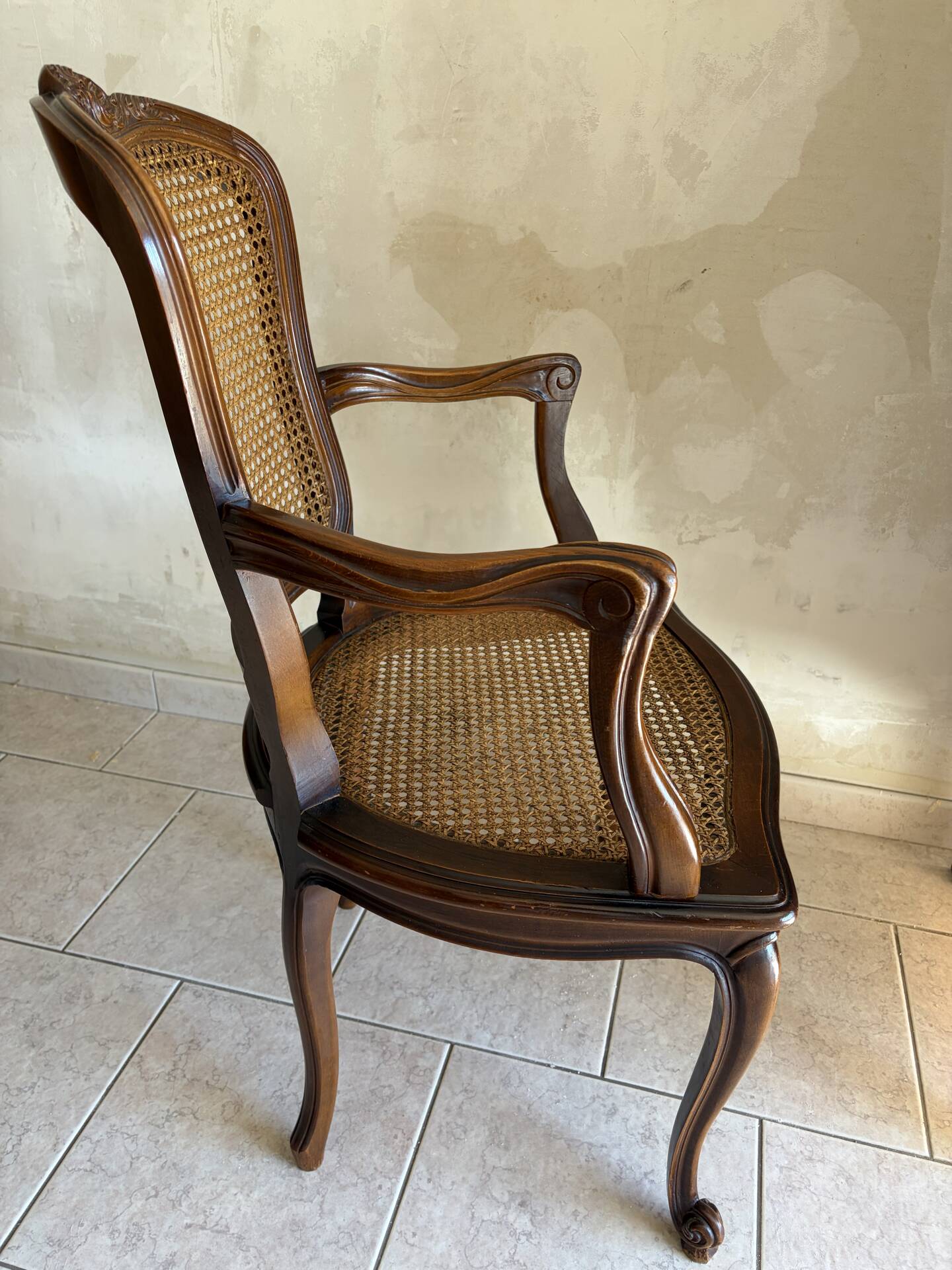 Wood and cane armchair