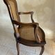 Wood and cane armchair