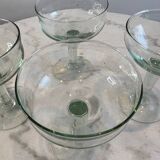 Set of four blown glass stemmed glasses.