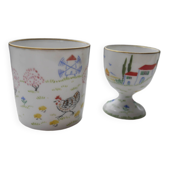 Delvaux hand-painted porcelain cup and egg cup duo
