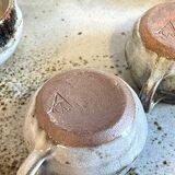 Enamelled stoneware tray and its 7 cups