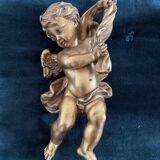 Paire d'anges en bois doré à la feuille d'or