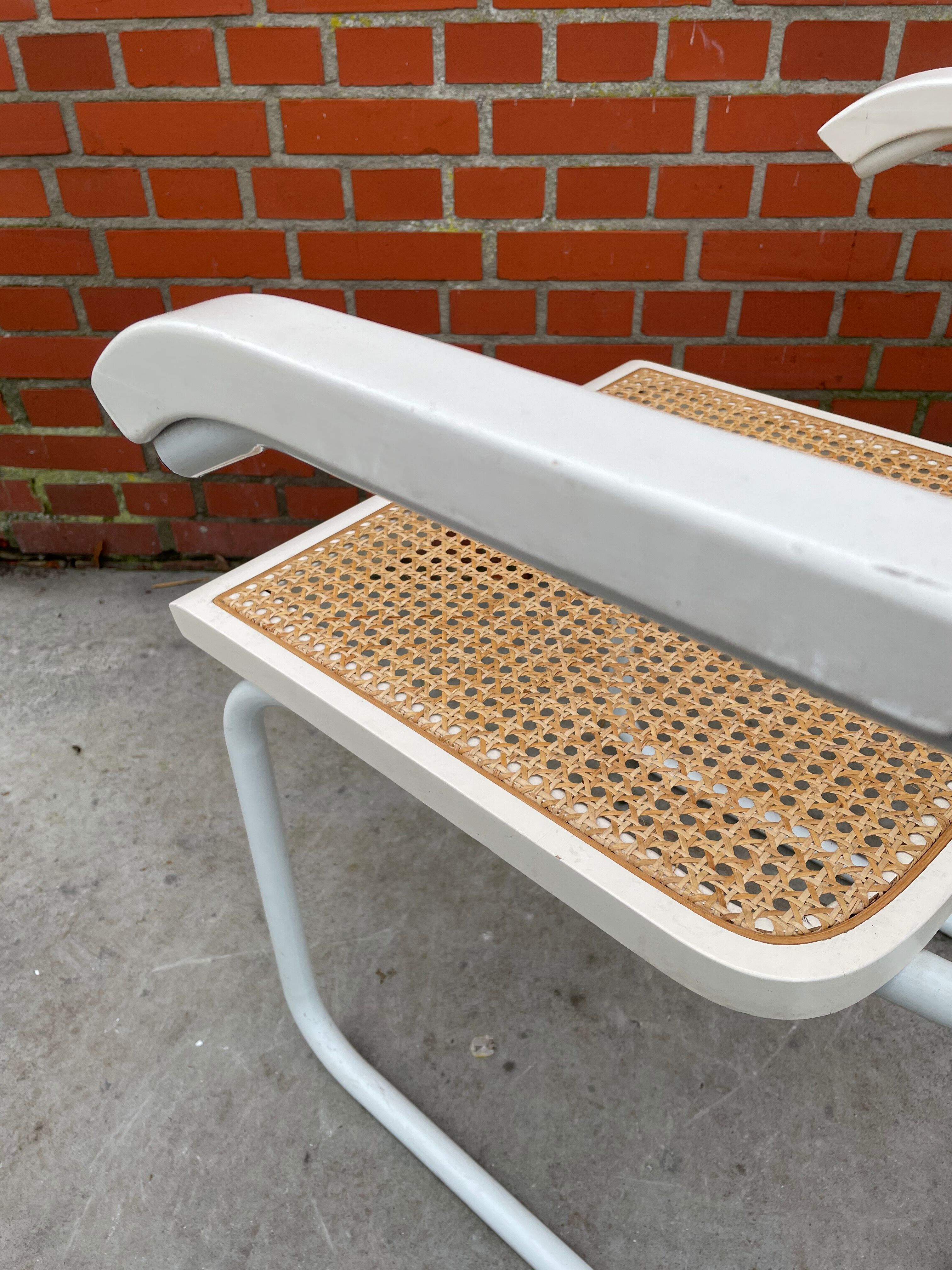 Cesca chair model with armrest in white