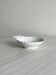 Shell-shaped dish in white porcelain