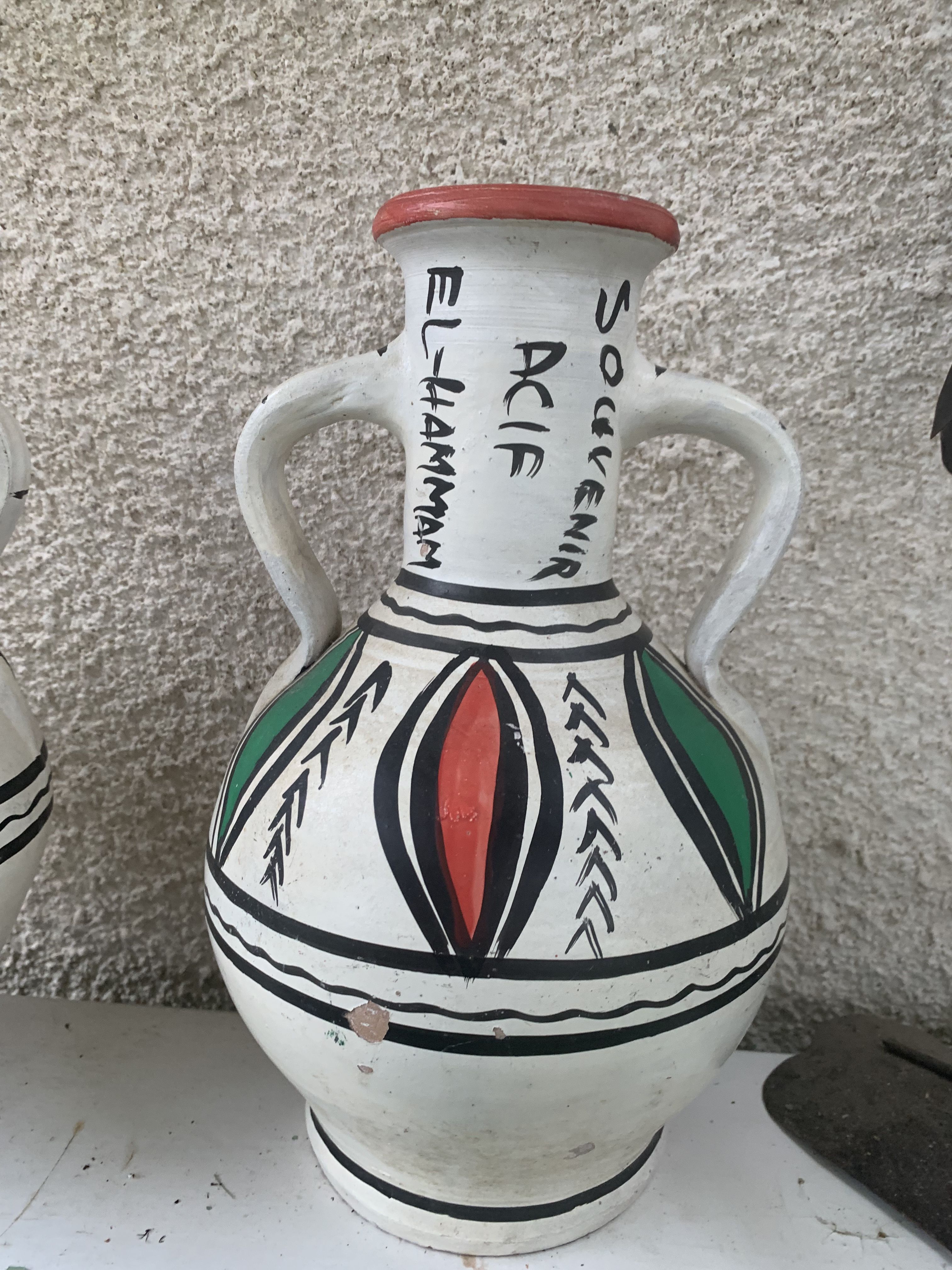 Pair of amphora vase, vintage artisanal and oriental pottery