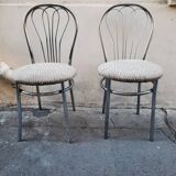 Pair of tubular metal bistro chairs