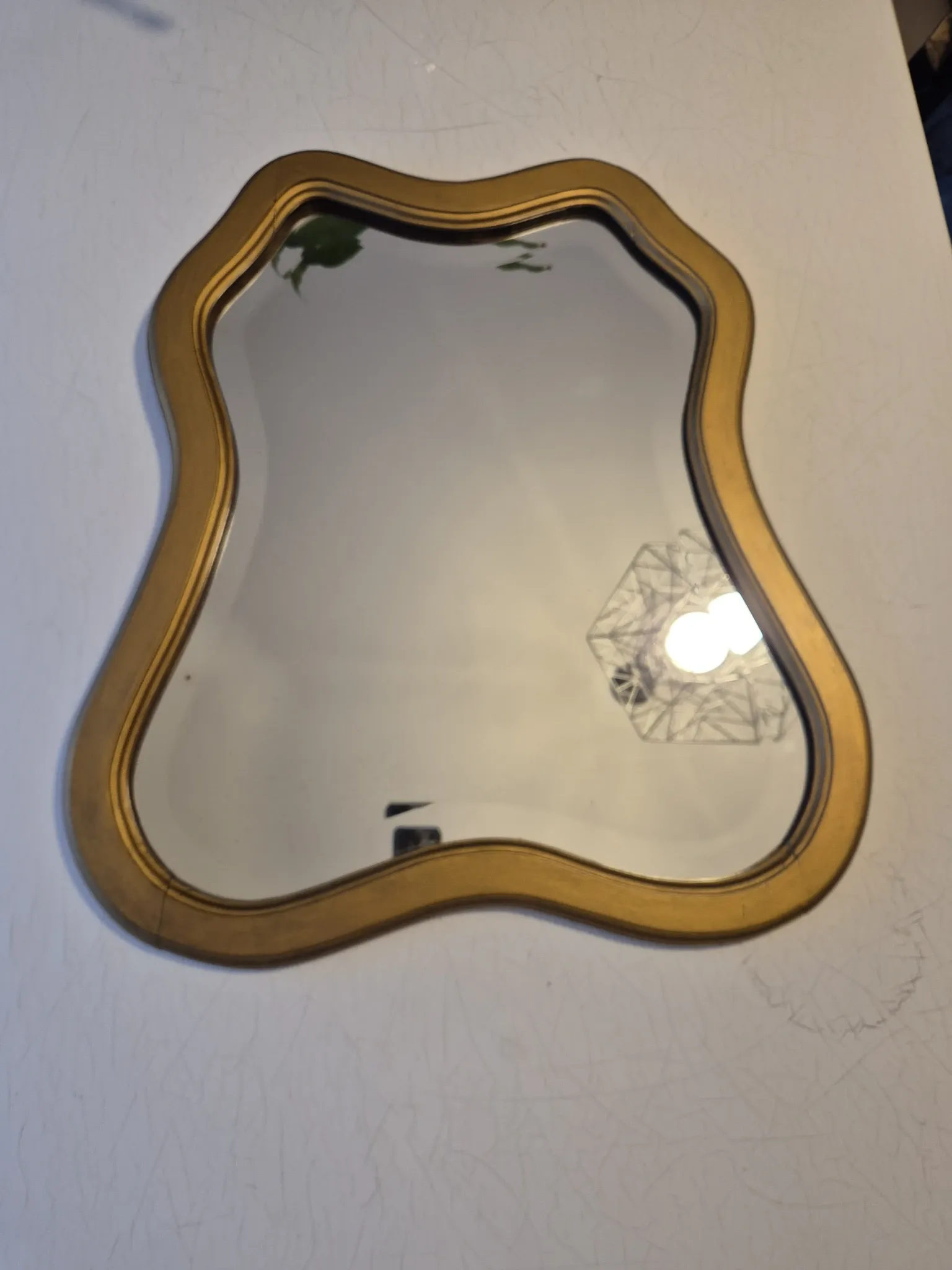 Vintage organic bevelled gold wooden mirror, Art Deco period.