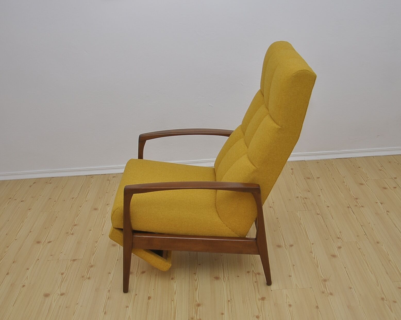 Mid-century armchair with folding footrest, 1960s