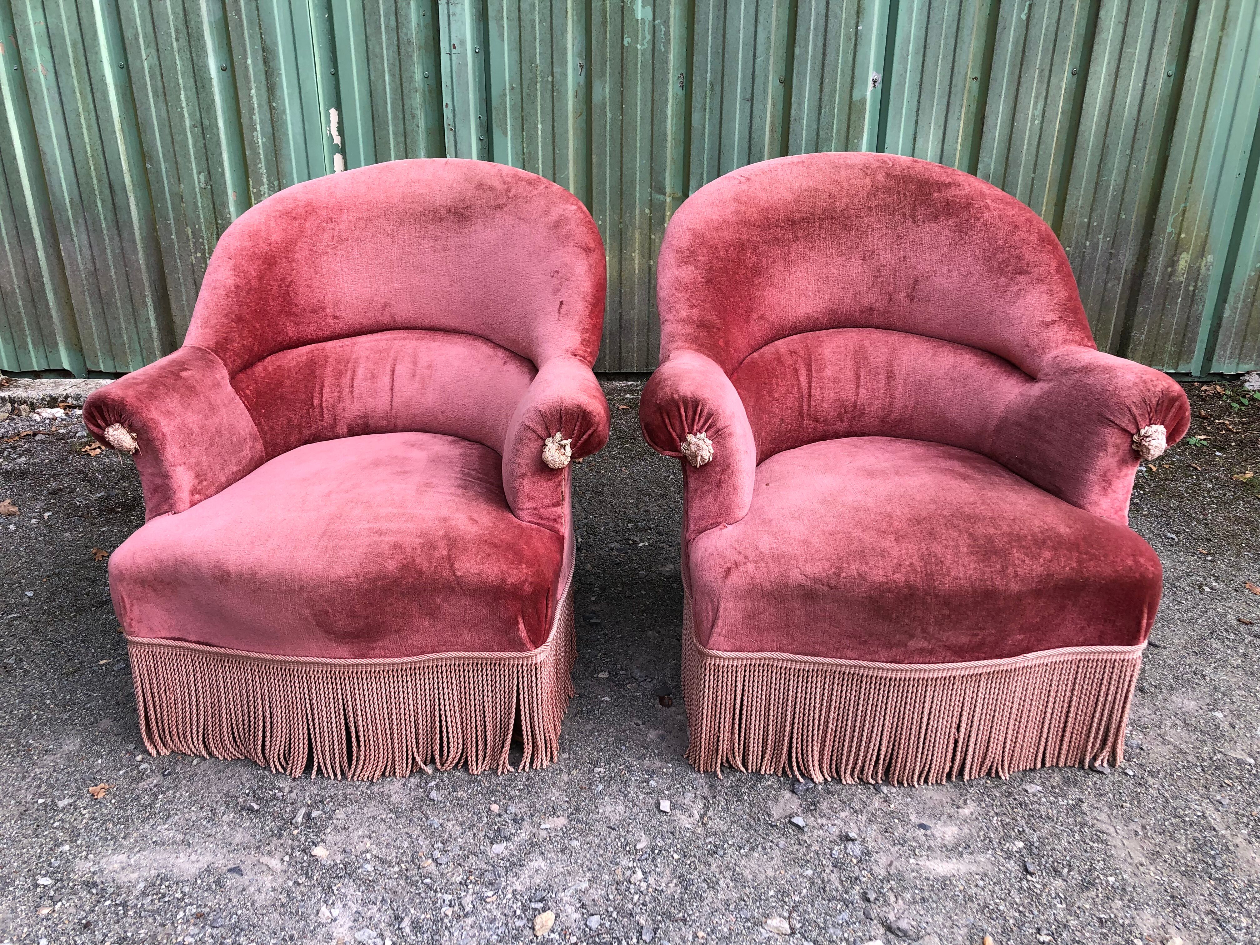 Duo de fauteuils vintage crapaud en velours saumon