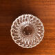 Old pair of vintage round molded glass candle holder
