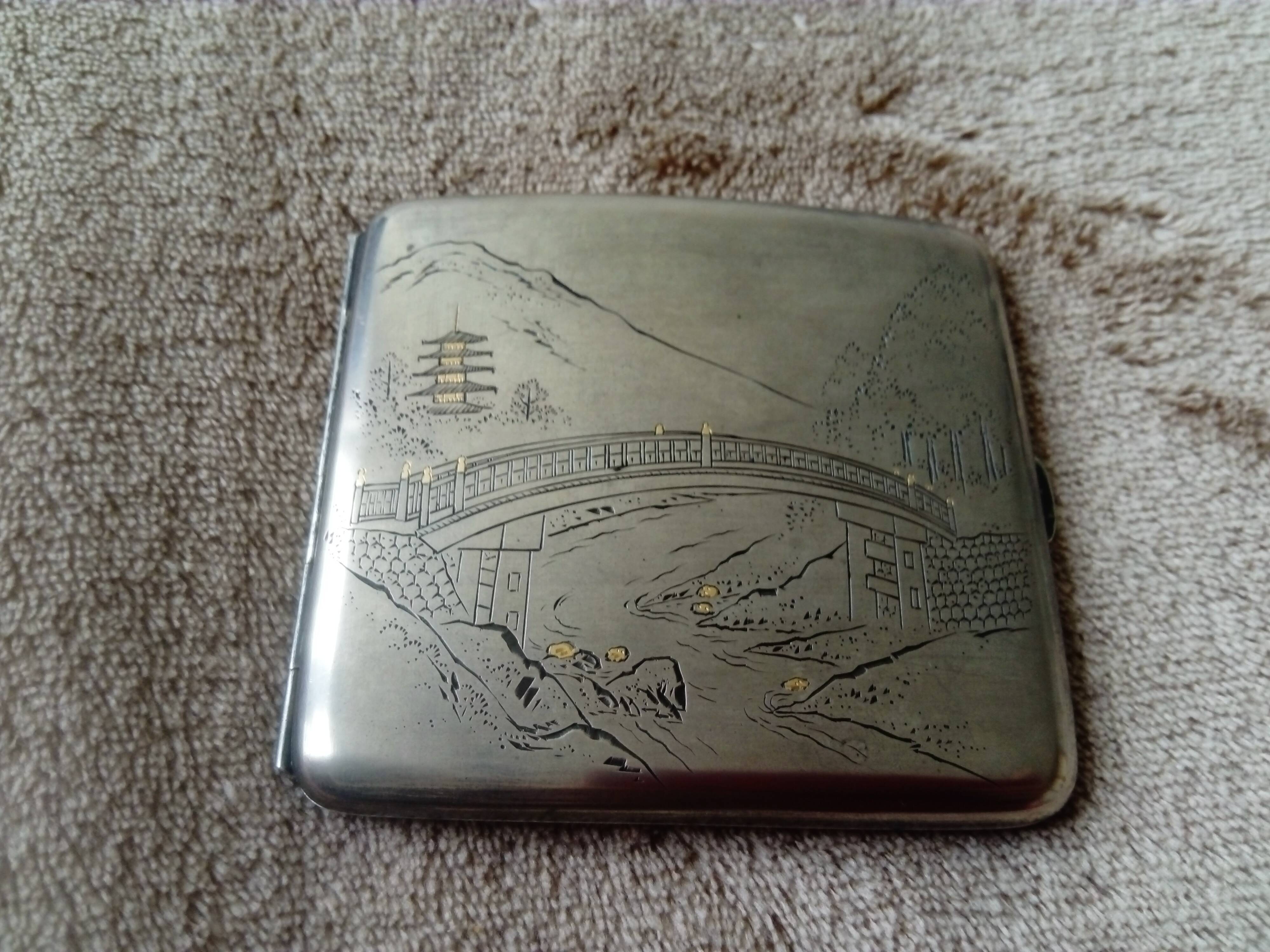 Old sterling silver cigarette case with Japanese decor