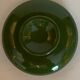 Vintage green ashtray on foot