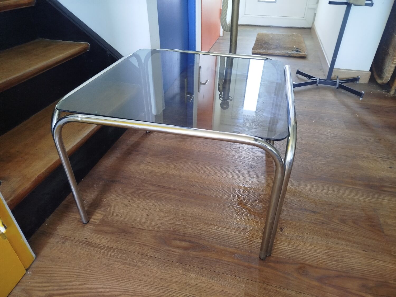 Italian design coffee table with chrome metal and smoked glass from the 1970s.