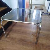 Italian design coffee table with chrome metal and smoked glass from the 1970s.