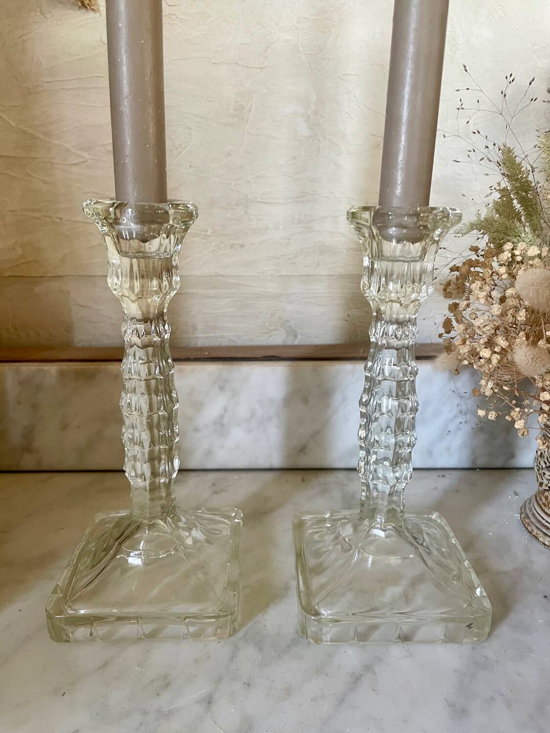 Pair of molded glass candlesticks