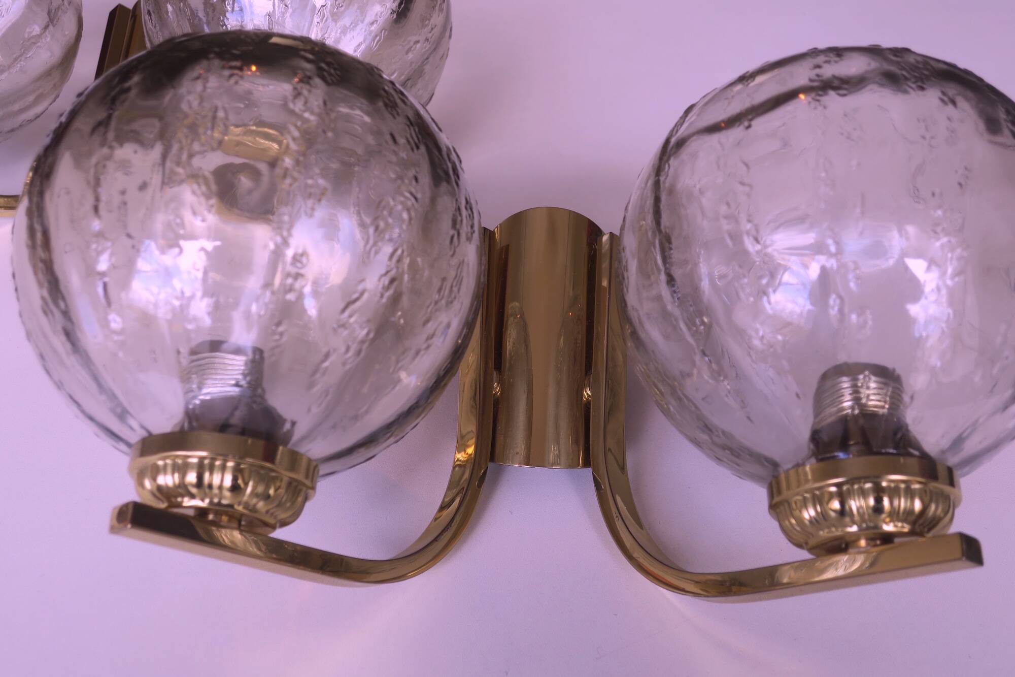 Mid century pair of brass and glass double wall lights, 1970s