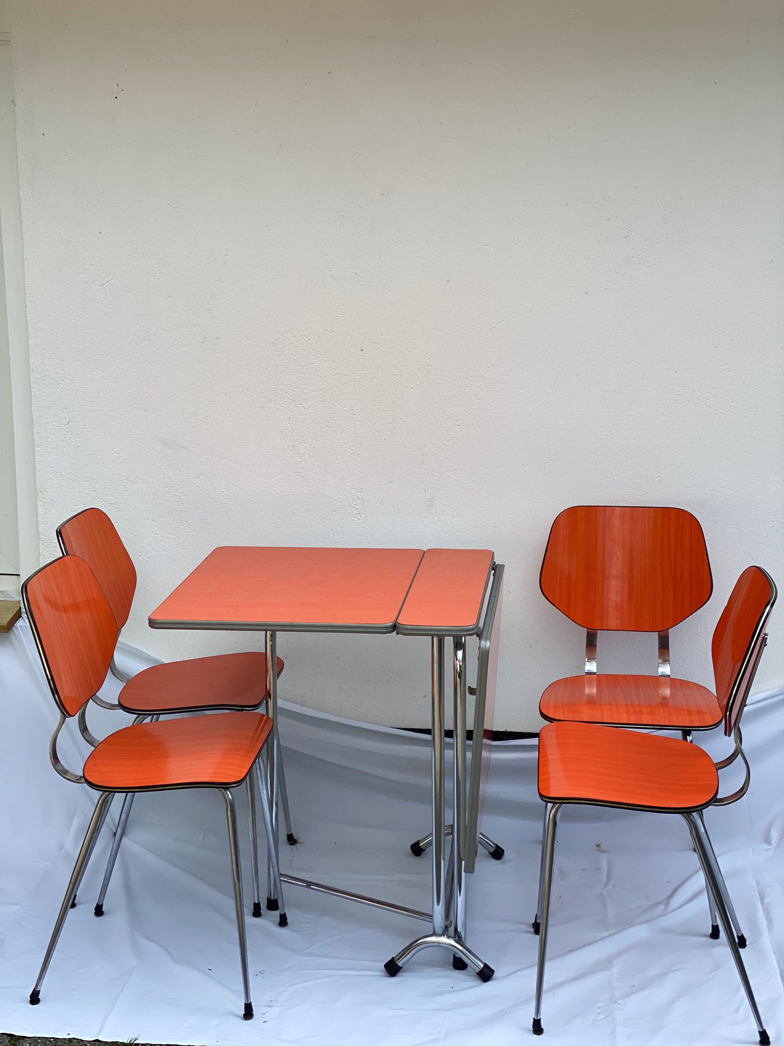 Orange formica table and 4 chairs