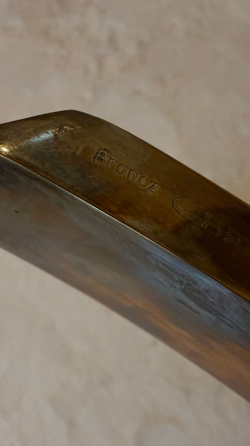 Gilt brass console table with glass top by Jacques Quinet