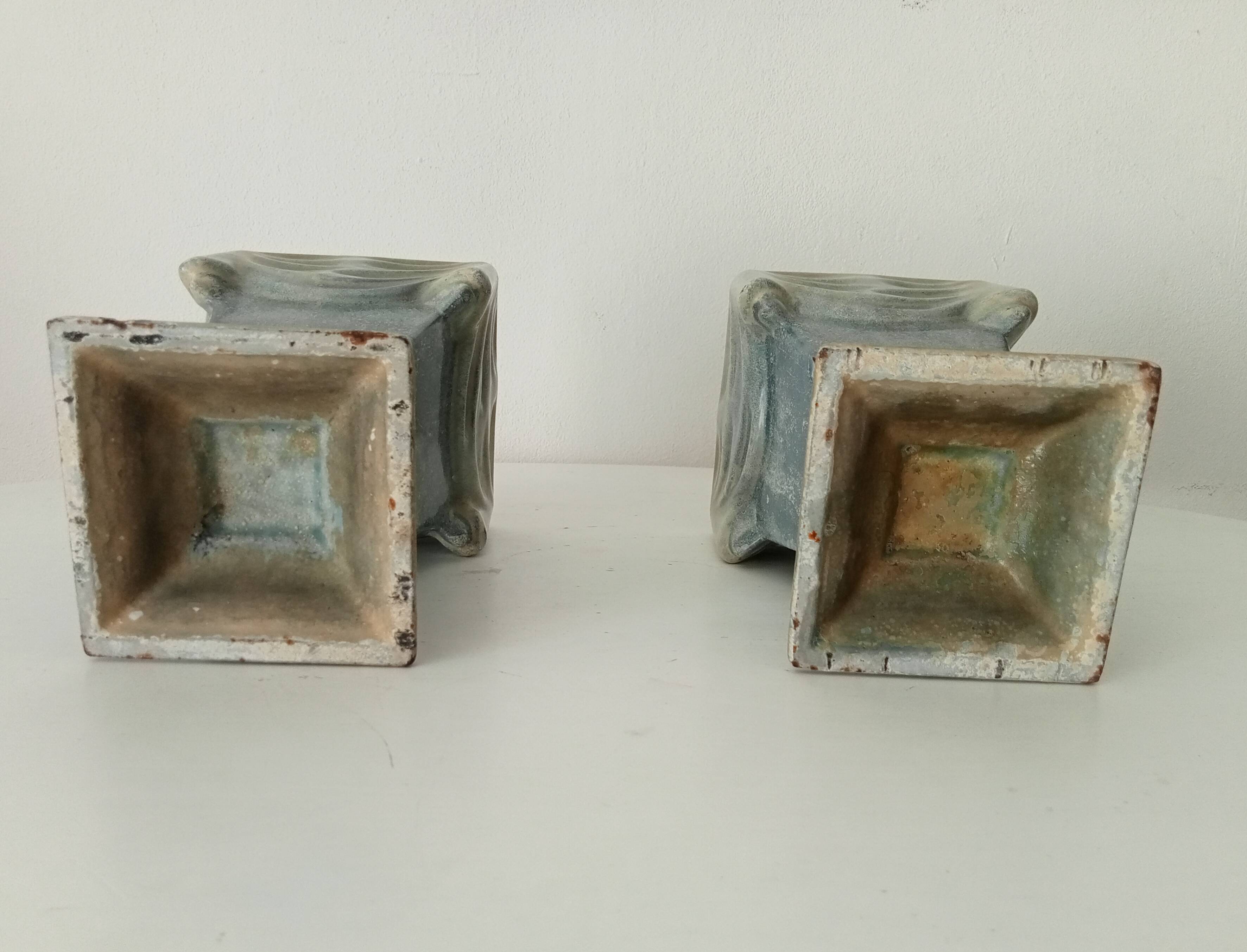 Pair of old art deco vases in enameled cast iron