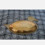 Empty brass pocket forming a duck