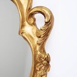 Baroque mirror in golden resin