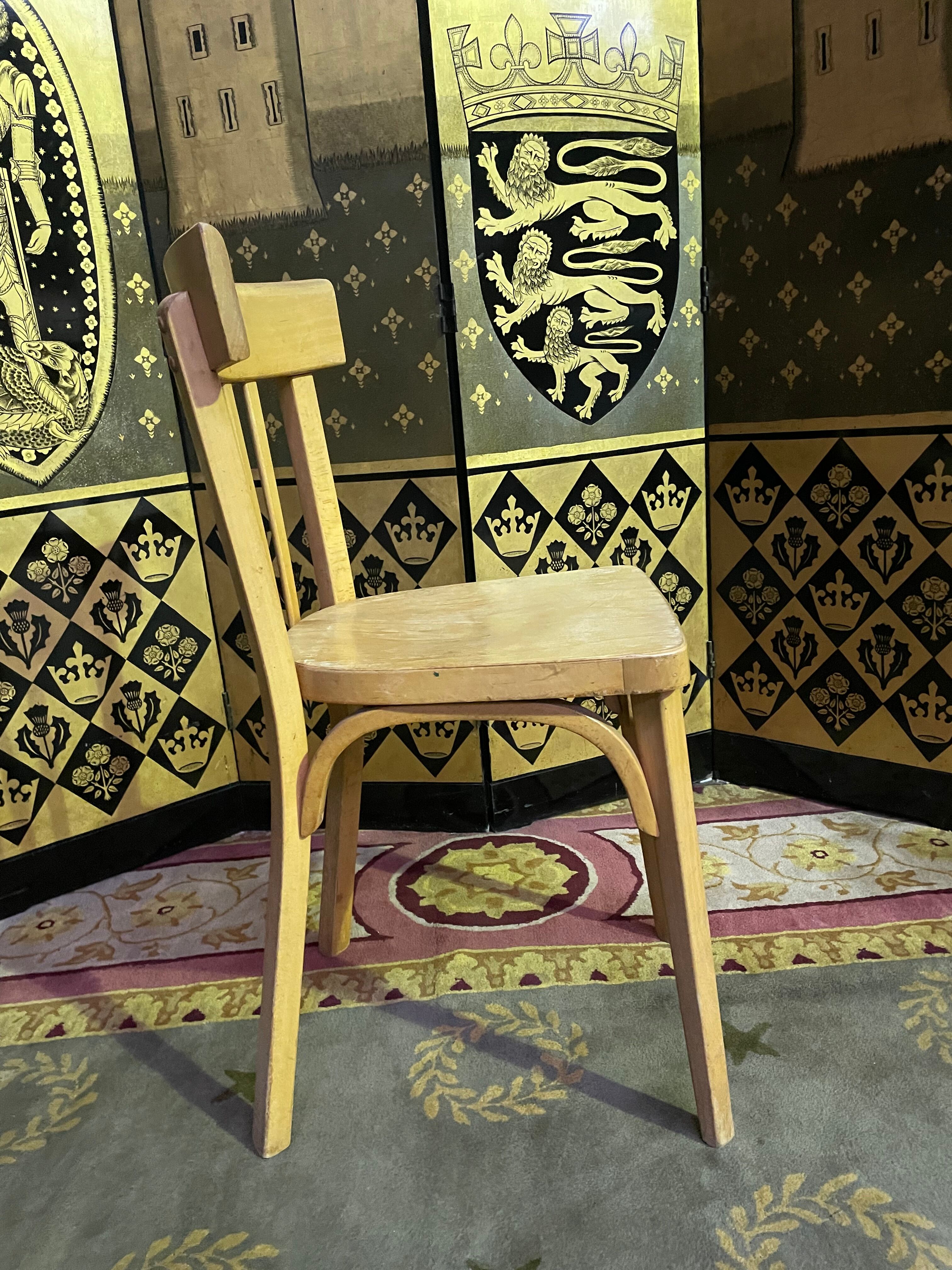 Suite of 6 bistro chairs signed "baumann"