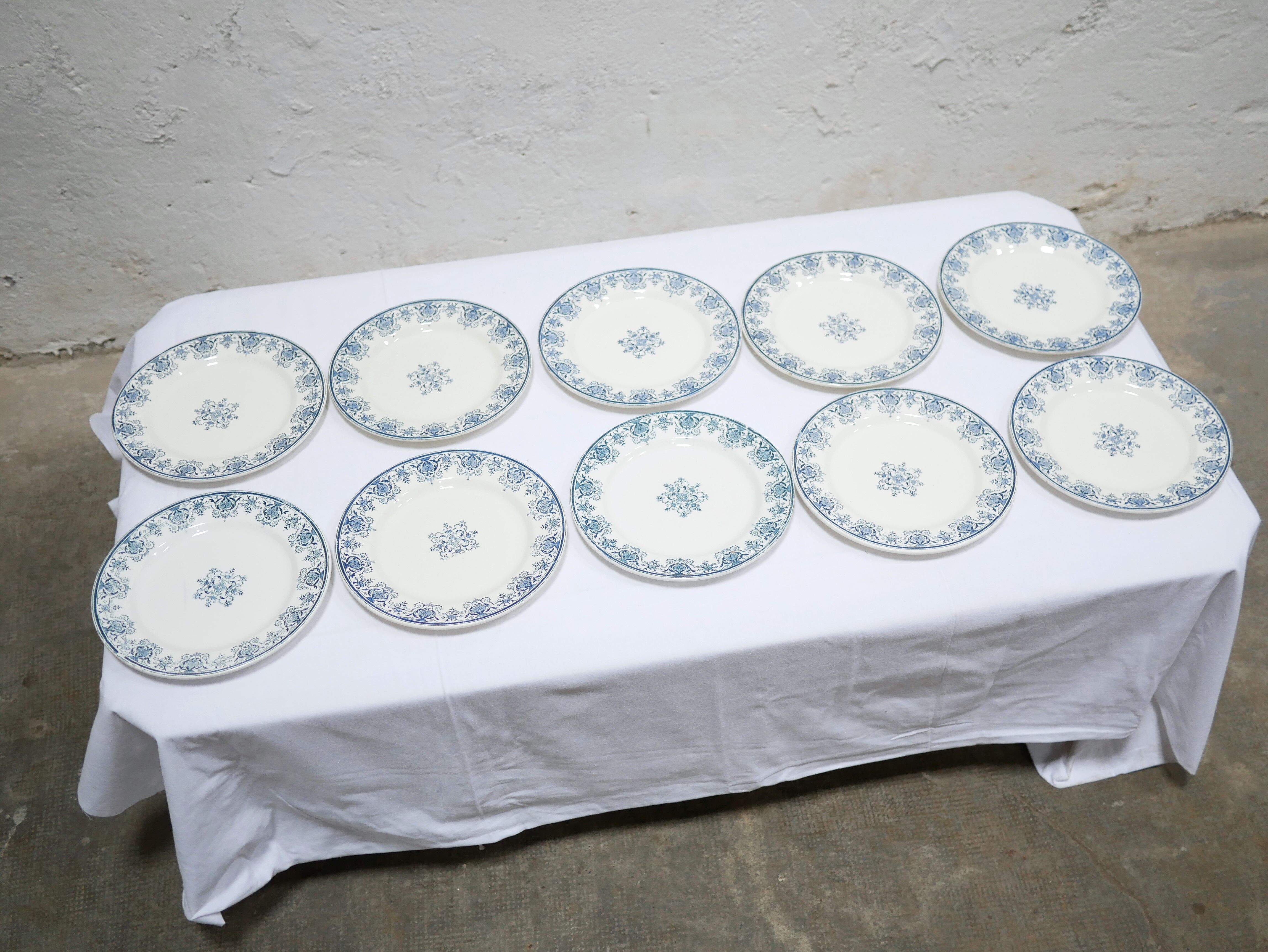 Series of 10 old Terre de Fer plates by L.G. for the earthenware factory of Clairefontaine
