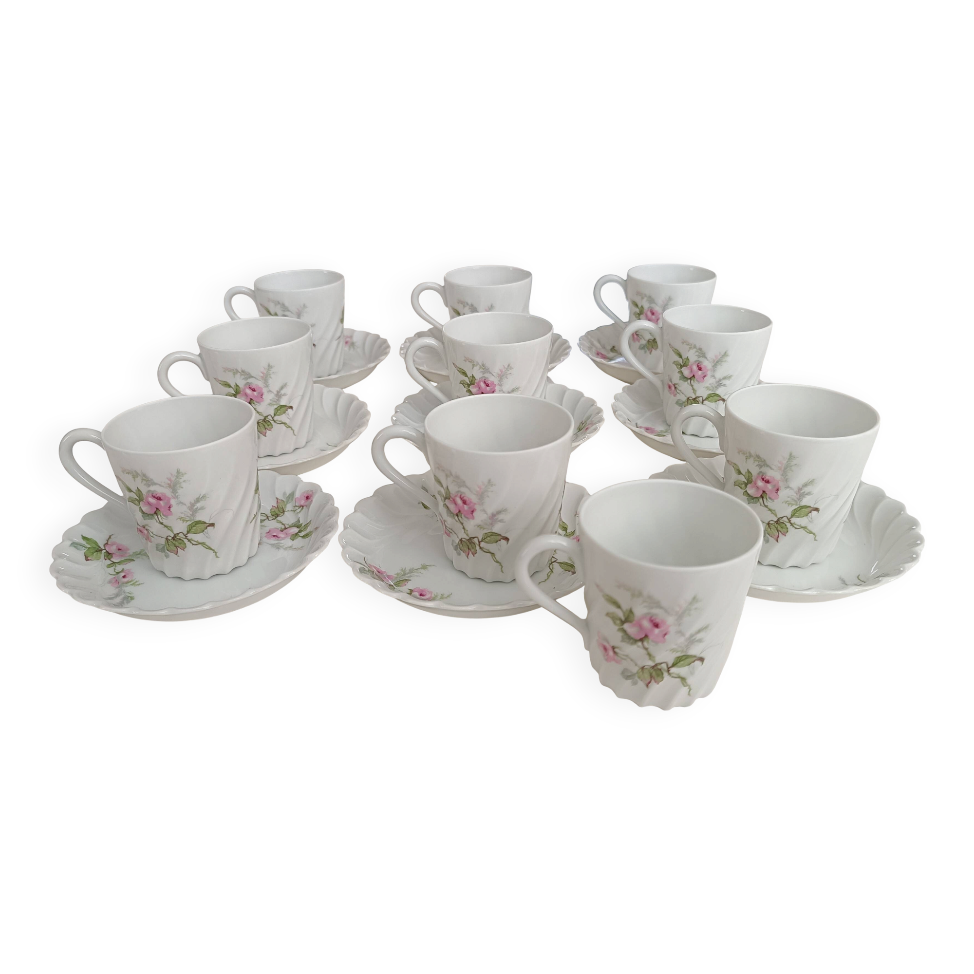 Haviland Limoges porcelain 10 coffee cups and 9 saucers with floral decoration.