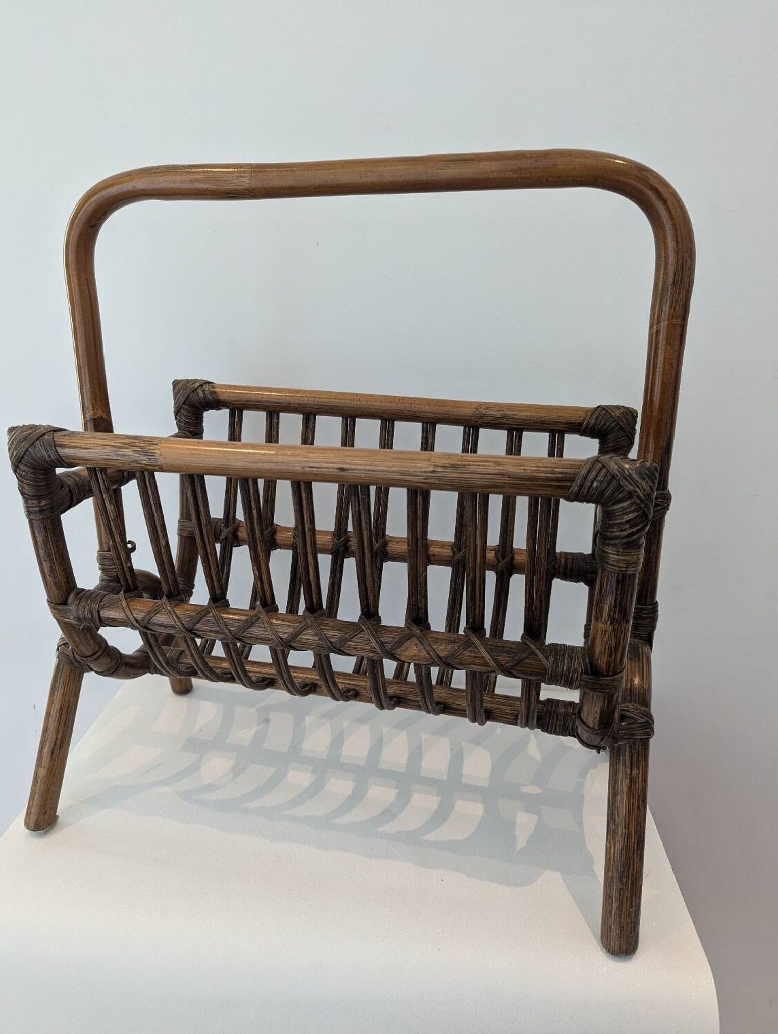 Vintage rattan magazine rack