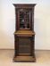Two-body display cabinet in oak, Henri II style.