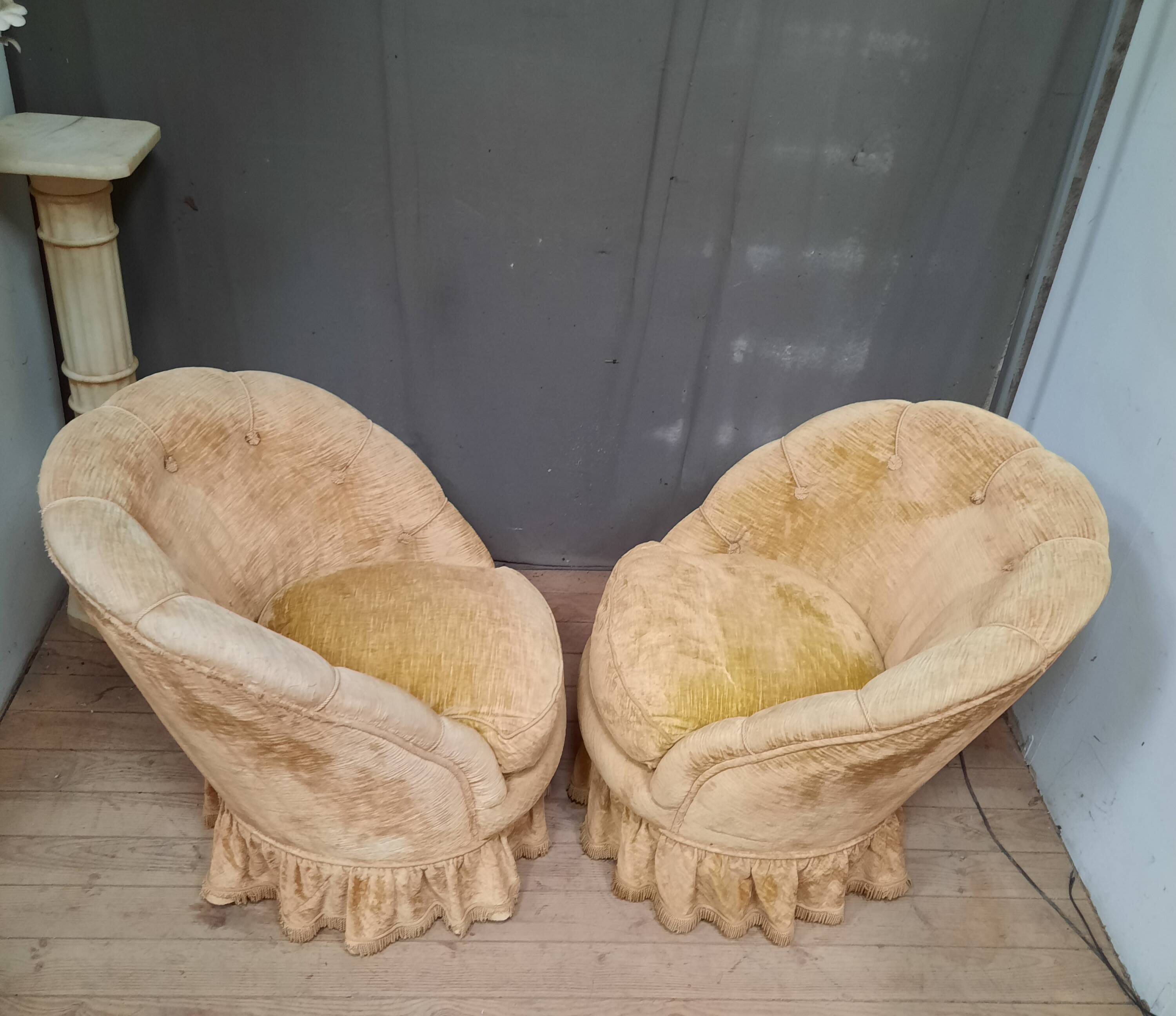 Pair of flared back toad armchairs